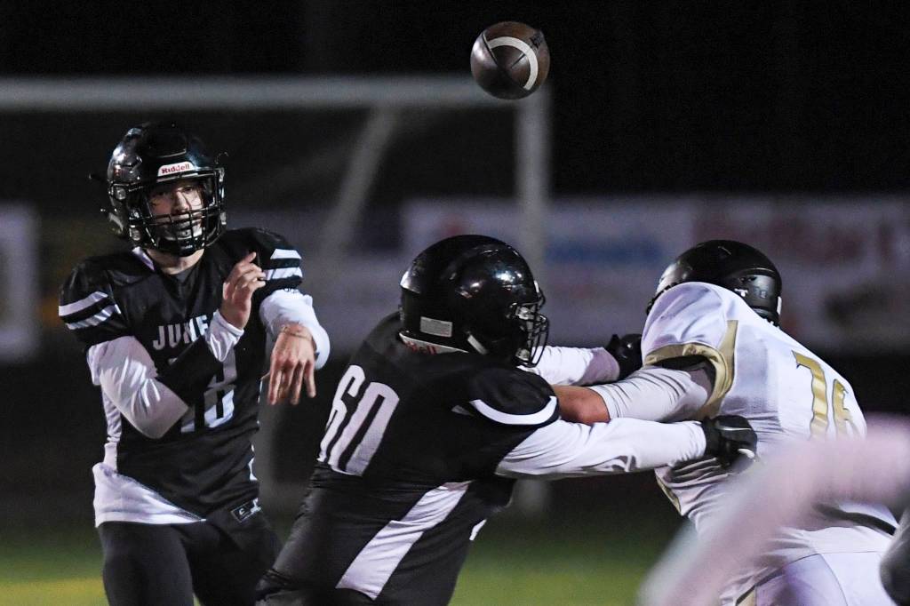 Juneaus quarterback Cooper Kriegmont passes against South Anchorage at Adair-Kennedy Memorial Field on Saturday, Oct. 12, 2019. South Anchorage won 54-14. (Michael Penn | Juneau Empire)