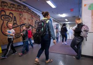 Students at Yaakoosgé Daakahídi Alternative High School prepare to leave the Marie Drake Building after school on May 25, 2015.