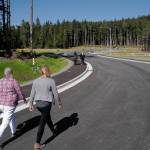 In this file photo, Mayor Beth Weldon and Assembly Member Carole Triem take a stroll on Karl Reishus Boulevard after a ribbon-cutting ceremony to commemorate the near completion of the Pederson Hill Subdivision on Friday, Sept. 6, 2019. Reishus was a Juneau Police Department officer who died in 1992 when he fell from a 40-foot tower during a training exercise. (Michael Penn | Juneau Empire FIle)