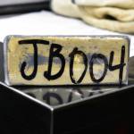 A gold bar worth roughly $100,000, according to Kensington Mine staff on Monday, Oct. 14, 2019. (Peter Segall | Juneau Empire)