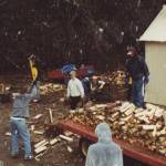 The Juneau-Douglas High School boys soccer team cuts firewood for a team fundraiser Out The Road in 2000. (Courtesy Photo | Gary Lehnhart)