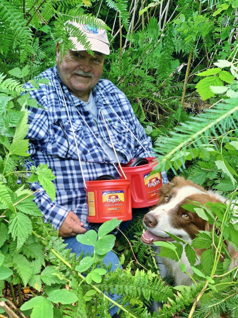 Mickey Prescott and Oscar picking red huckleberries. (Vivian Faith Prescott | For the Juneau Empire)