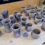 Ceramic cups freshly out of Mercedes Muñozs home studio kiln on Monday, Oct. 28, 2019. (Michael Penn | Juneau Empire)