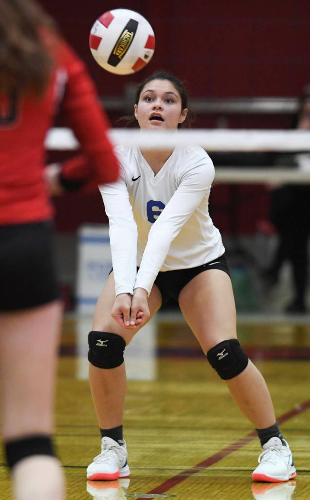 Thunder Mountains Kaylani Tupou bumps the ball up against Juneau-Douglas at Juneau-Douglas High School: Yadaa.at Kalé on Friday, Nov. 1, 2019. Thunder Mountain won 3-0 (25-14, 25-20, 25-20). ( Michael Penn | Juneau Empire)