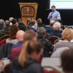 Juneau residents listen to a U.S. Department of Agriculture Forest Service informational meeting lead by National Forest System Deputy Chief Chris French on the Rulemaking for Alaska Roadless Areas Draft Environmental Impact Statement at Elizabeth Peratrovich Hall on Monday, Nov. 4, 2019. (Michael Penn | Juneau Empire)
