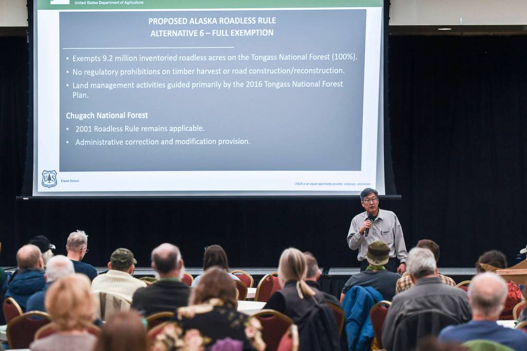 Juneau residents listen to Kenneth Tu, U.S. Forest Service regional administrative review coordinator, during a U.S. Department of Agriculture Forest Service informational meeting on the Rulemaking for Alaska Roadless Areas Draft Environmental Impact Statement at Elizabeth Peratrovich Hall on Monday, Nov. 4, 2019. (Michael Penn | Juneau Empire)