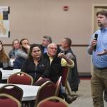 Juneau residents listen to a U.S. Department of Agriculture Forest Service informational meeting lead by National Forest System Deputy Chief Chris French on the Rulemaking for Alaska Roadless Areas Draft Environmental Impact Statement at Elizabeth Peratrovich Hall on Monday, Nov. 4, 2019. (Michael Penn | Juneau Empire)