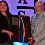 American Fisheries Society President Jesse Trushenski presents Stan Moberly the first Stanley A. Moberly Award for Outstanding Contributions in Fish Habitat Conservation. (Courtesy Photo | American Fisheries Society)