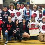 The JDHS hockey team poses for a photo after volunteering at the Douglas Ghost Walk. (Courtesy photo)