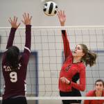 Juneau-Douglas Brooke Sanford, right, spikes against Ketchikans Maddy Purcell during the Region V Volleyball Tournament at Thunder Mountain High School on Thursday, Nov. 7, 2019. JDHS won 25-8, 25-14, 14-25, 25-15. (Michael Penn | Juneau Empire)
