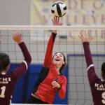 Juneau-Douglas Jenae Pusich spikes the ball against Ketchikans Lindsey Byron, left, and Maddy Purcell during the Region V Volleyball Tournament at Thunder Mountain High School on Thursday, Nov. 7, 2019. JDHS won 25-8, 25-14, 14-25, 25-15. (Michael Penn | Juneau Empire)