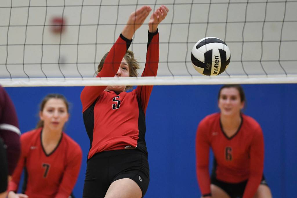 Juneau-Douglas Brooke Sanford bumps the ball up against Ketchikan during the Region V Volleyball Tournament at Thunder Mountain High School on Thursday, Nov. 7, 2019. JDHS won 25-8, 25-14, 14-25, 25-15. (Michael Penn | Juneau Empire)