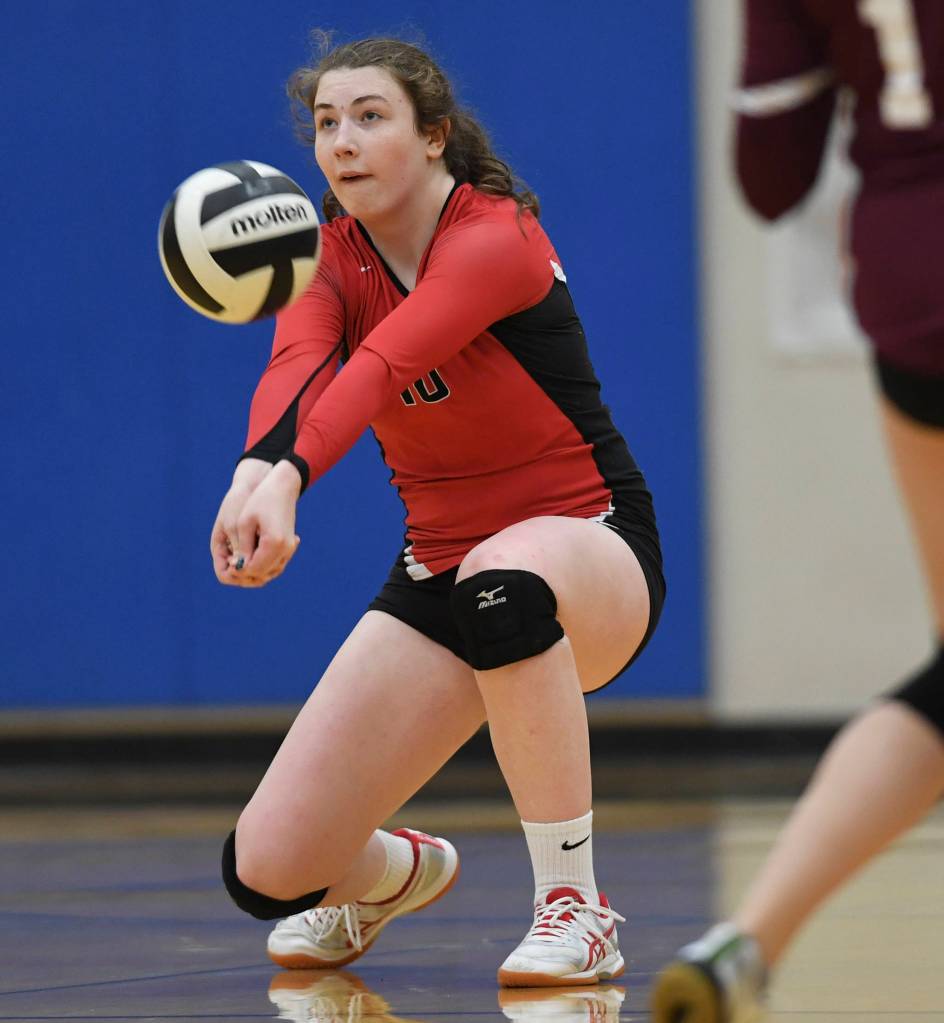 Juneau-Douglas Merry Newman bumps the ball up against Ketchikan during the Region V Volleyball Tournament at Thunder Mountain High School on Thursday, Nov. 7, 2019. JDHS won 25-8, 25-14, 14-25, 25-15. (Michael Penn | Juneau Empire)
