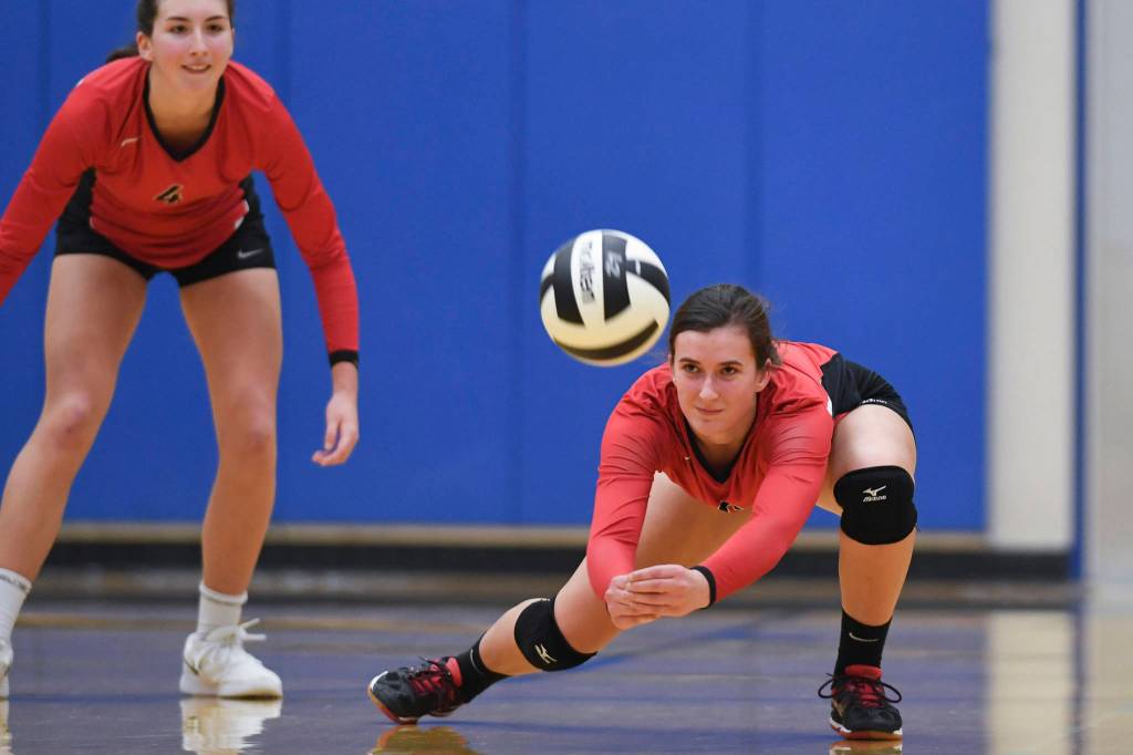 Juneau-Douglas Addie Prussing bumps the ball up against Ketchikan during the Region V Volleyball Tournament at Thunder Mountain High School on Thursday, Nov. 7, 2019. JDHS won 25-8, 25-14, 14-25, 25-15. (Michael Penn | Juneau Empire)