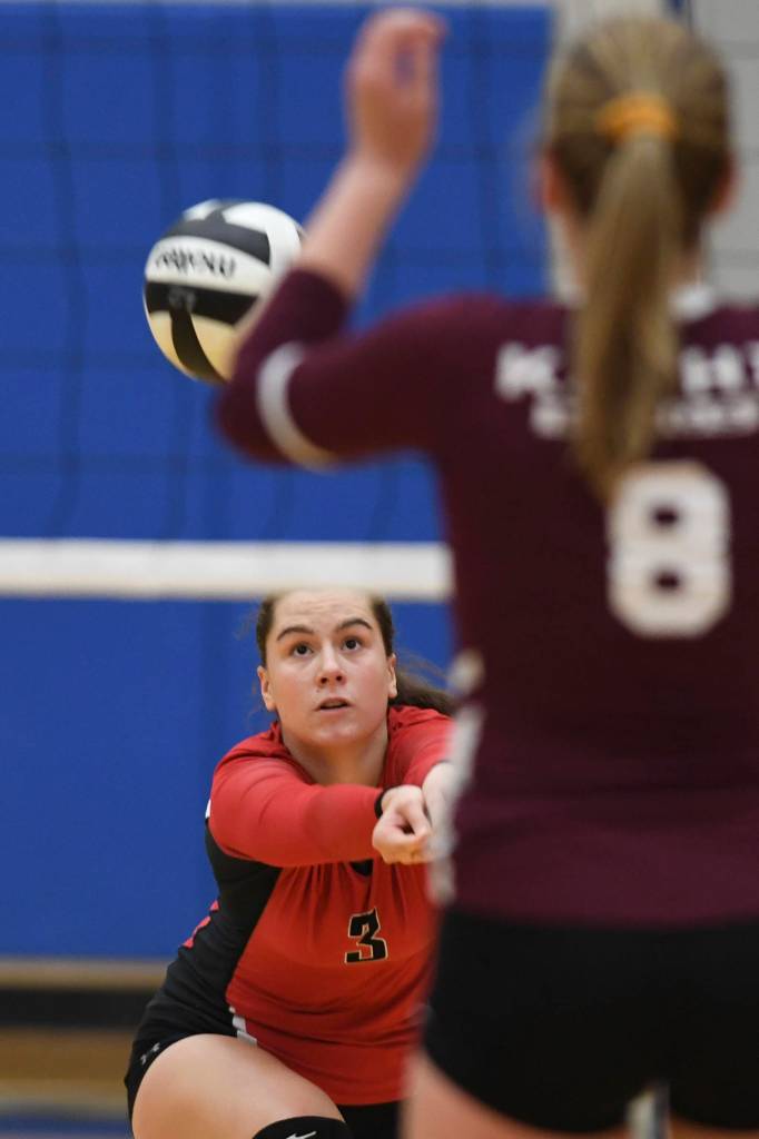 Juneau-Douglas Abby Dean bumps the ball up against Ketchikan during the Region V Volleyball Tournament at Thunder Mountain High School on Thursday, Nov. 7, 2019. JDHS won 25-8, 25-14, 14-25, 25-15. (Michael Penn | Juneau Empire)
