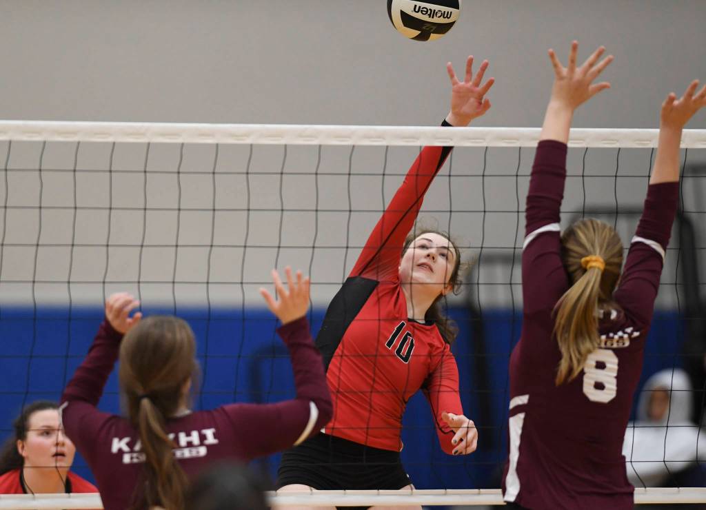 Juneau-Douglas Merry Newman spikes against Ketchikan during the Region V Volleyball Tournament at Thunder Mountain High School on Thursday, Nov. 7, 2019. JDHS won 25-8, 25-14, 14-25, 25-15. (Michael Penn | Juneau Empire)