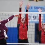 Juneau-Douglas Jenae Pusich, center, and Addie prussing attempt to block as shot by Ketchikans LIndsey Byron during the Region V Volleyball Tournament at Thunder Mountain High School on Thursday, Nov. 7, 2019. JDHS won 25-8, 25-14, 14-25, 25-15. (Michael Penn | Juneau Empire)