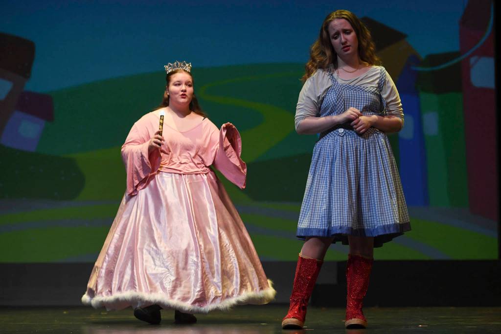 Glinda the Good Witch, played by Nicole Yancey, left, and Dorothy Gale, played by Devin Moorehead, perform during rehearsal for the Thunder Mountain High School production of Choose Your Own Oz at TMHS on Friday, Nov. 8, 2019. (Michael Penn | Juneau Empire)