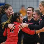 Juneau-Douglas Paige Adams, center, celebrates a point with her teammates against Thunder Mountain during the Region V Volleyball Tournament at Thunder Mountain High School on Friday, Nov. 8, 2019. JDHS won 3-0 (25-22, 26-24, 25-20). (Michael Penn | Juneau Empire File)