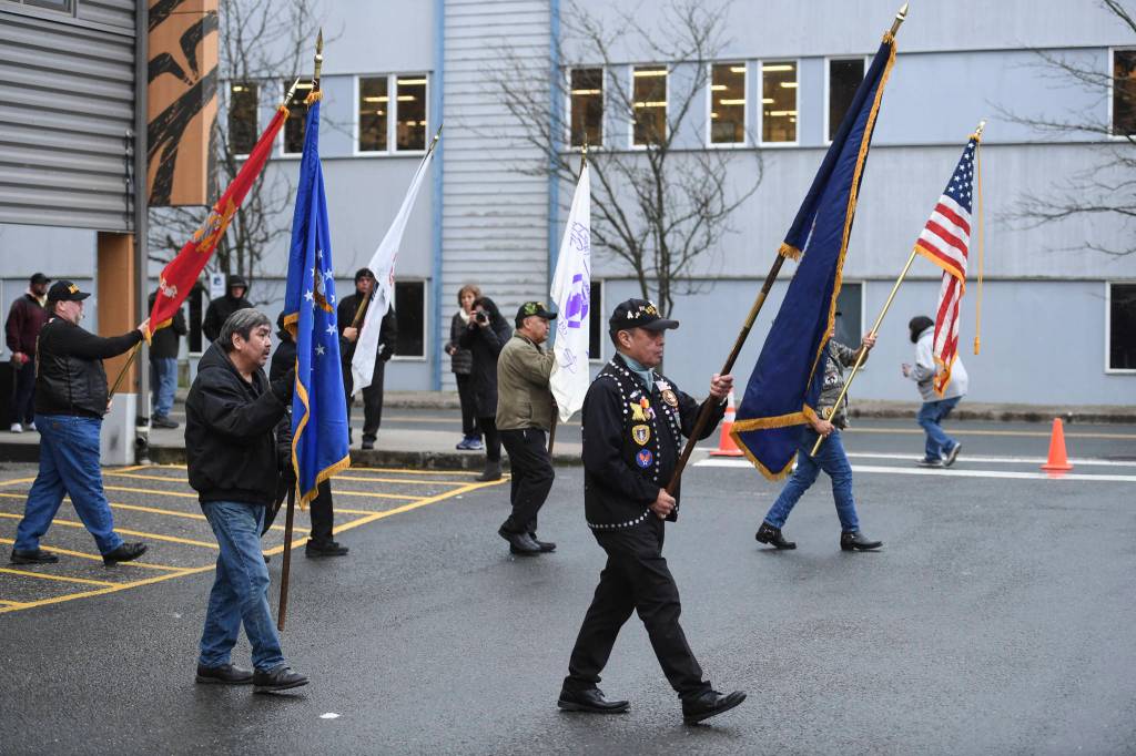 Southeast Alaska Native Veterans Color Guard presents the colors during the Veterans Day Ceremony at the SE Alaska Native Veterans Park on Monday, Nov. 11, 2019. (Michael Penn | Juneau Empire)