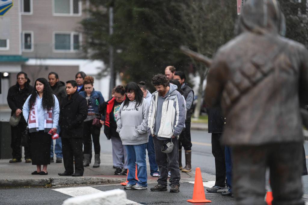 Juneau residents watch the Veterans Day Ceremony at the SE Alaska Native Veterans Park on Monday, Nov. 11, 2019. (Michael Penn | Juneau Empire)