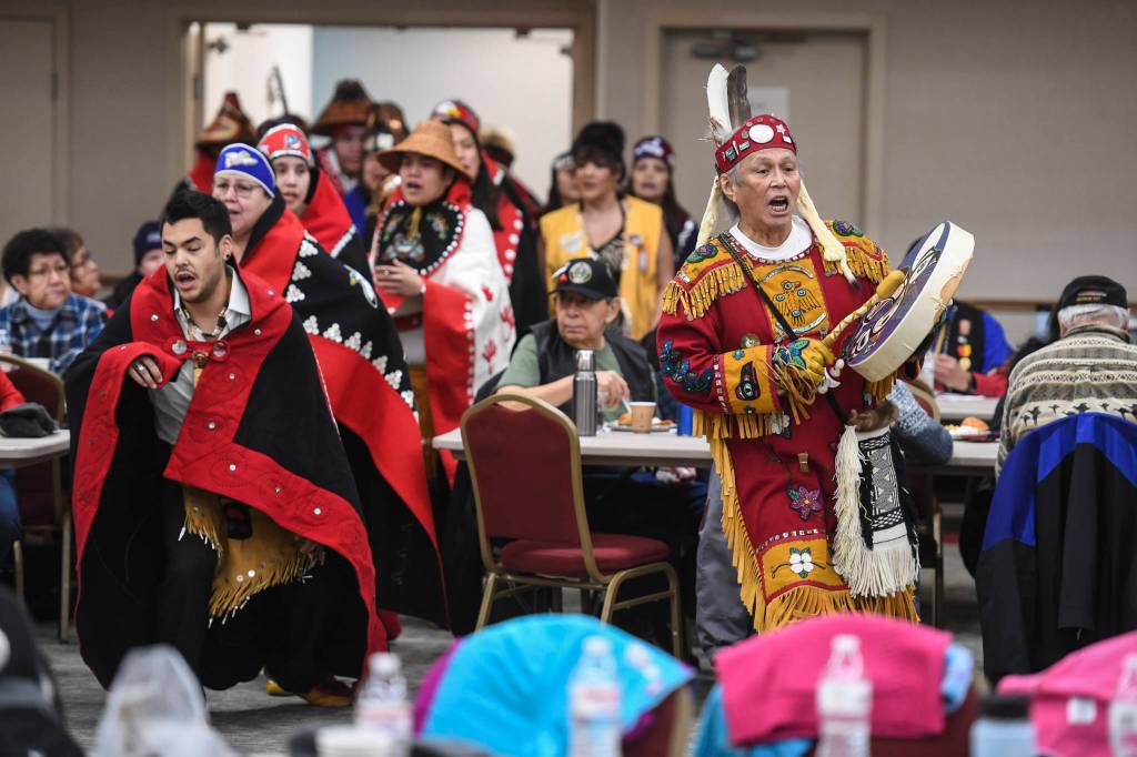 The Yaaw Tei Yi Dance Group performs during the Southeast Alaska Native Veterans Veterans Day luncheon at the Elizabeth Peratrovich Hall on Monday, Nov. 11, 2019. (Michael Penn | Juneau Empire)