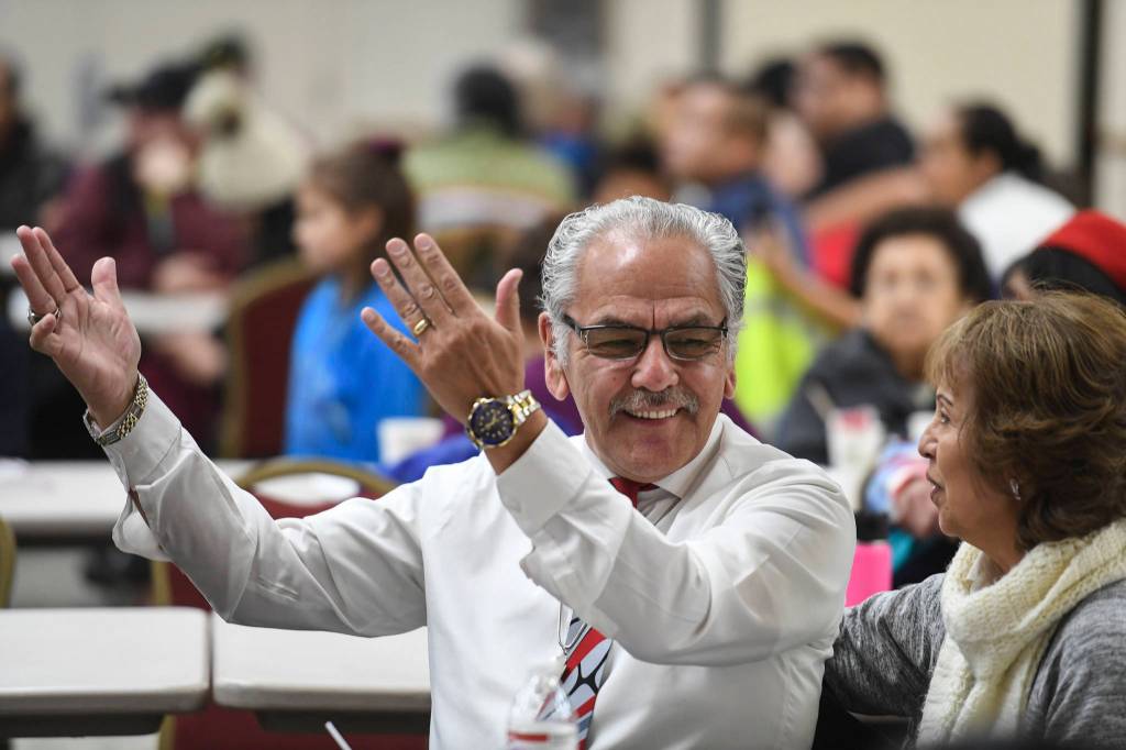Juneau residents watch the Yaaw Tei Yi Dance Group perform during the Southeast Alaska Native Veterans Veterans Day luncheon at the Elizabeth Peratrovich Hall on Monday, Nov. 11, 2019. (Michael Penn | Juneau Empire)