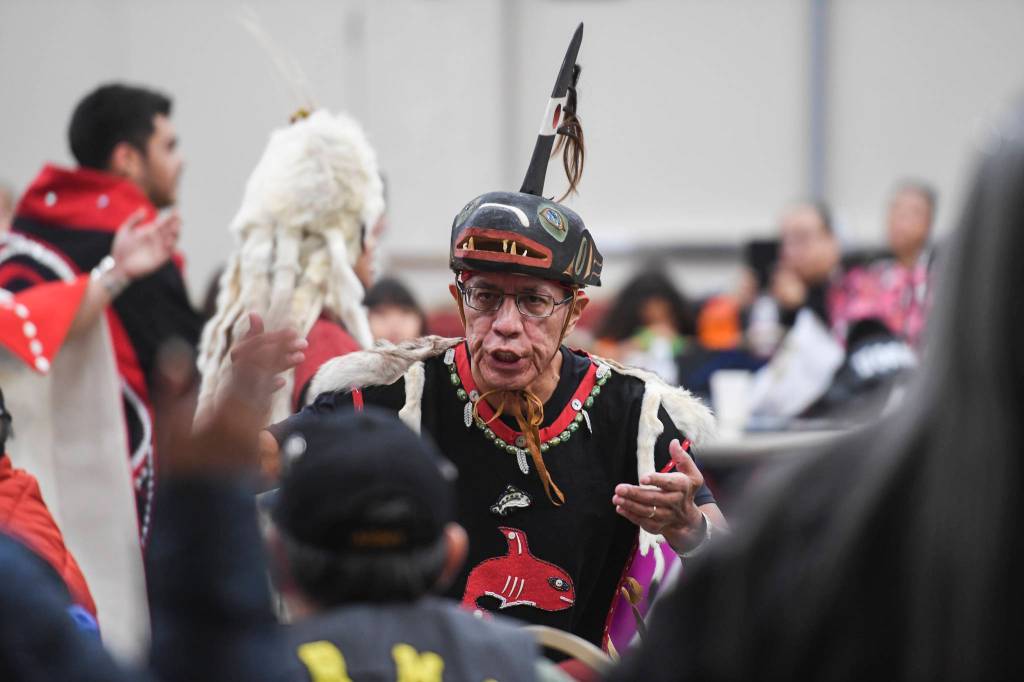 The Yaaw Tei Yi Dance Group performs during the Southeast Alaska Native Veterans Veterans Day luncheon at the Elizabeth Peratrovich Hall on Monday, Nov. 11, 2019. (Michael Penn | Juneau Empire)
