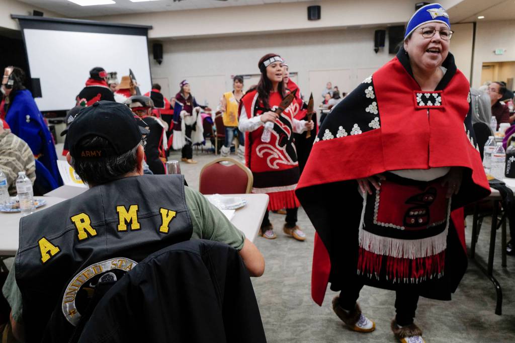 Marlis Mayeda, of the Yaaw Tei Yi Dance Group, right, performs during the Southeast Alaska Native Veterans Veterans Day luncheon at the Elizabeth Peratrovich Hall on Monday, Nov. 11, 2019. (Michael Penn | Juneau Empire)