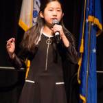 Elizabeth Djajalie sings the national anthem during a Veterans Day ceremony in Centennial Hall, Nov. 11, 2019. (Michael S. Lockett | Juneau Empire)