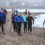 Members of the Juneau Nordic Ski Team practice at Sandy Beach on Friday, Nov. 8, 2019. The team, made up of middle and high school students, is finding alternative ways of training without snow as they prepare for their upcoming season. (Michael Penn | Juneau Empire)
