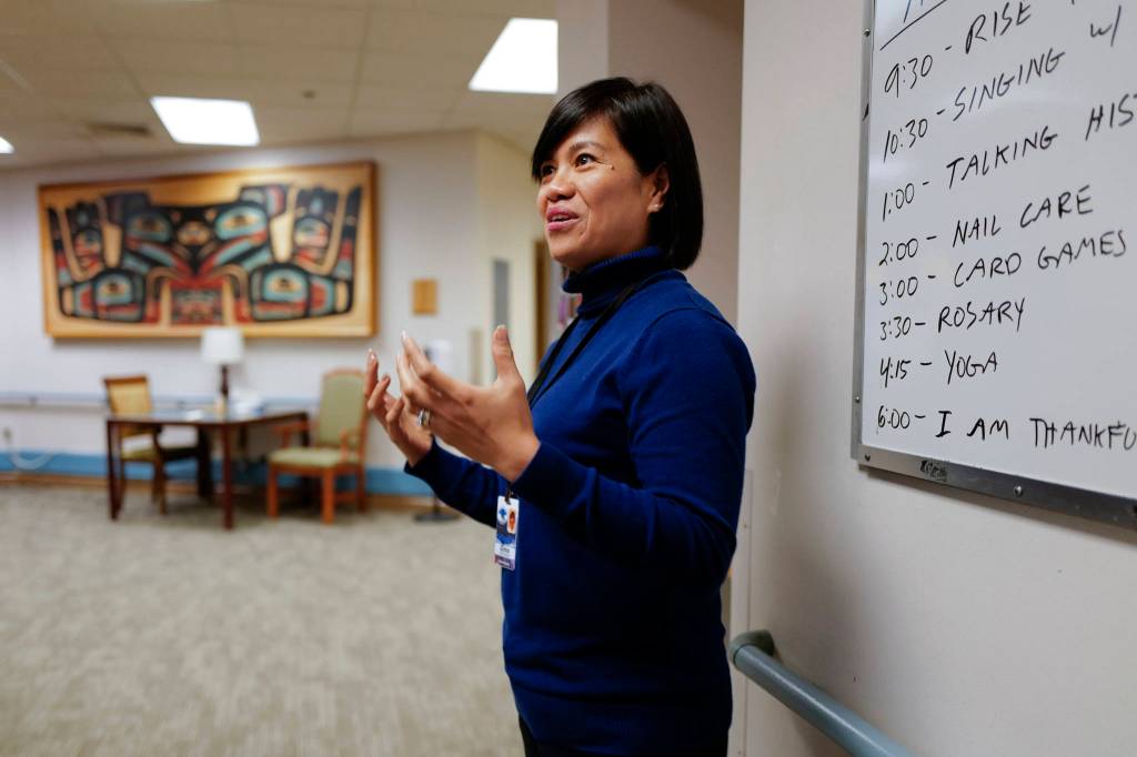 Juneau Pioneer Home Administrator Gina Del Rosario gives a tour of the Juneau Pioneer Home on Thursday, Nov. 14, 2019. (Michael Penn | Juneau Empire)
