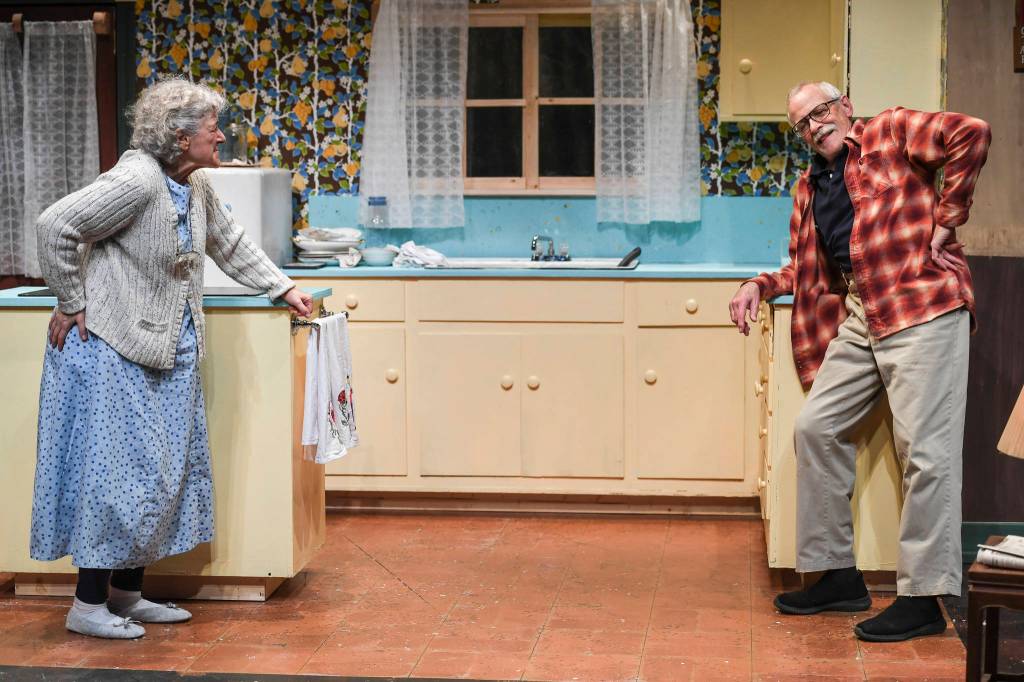 Clifford, played by Charlie Cardwell, and Minnie, played by Angelina Fiordellisi, rehearse in Perseverance Theatres production of With by playwright Carter Lewis on Tuesday, Nov. 19, 2019. With opens Friday Nov. 22 and runs through Dec. 15. (Michael Penn | Juneau Empire)