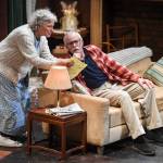 Clifford, played by Charlie Cardwell, and Minnie, played by Angelina Fiordellisi, rehearse in Perseverance Theatres production of With by playwright Carter Lewis on Tuesday, Nov. 19, 2019. (Michael Penn | Juneau Empire)