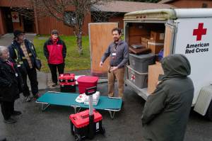 Andrew Bogar, disaster program manager for the American Red Cross in Juneau, shows emergency supplies during a workshop at the Shepherd of the Valley Lutheran Church on Friday, Nov. 15, 2019. The Red Cross is hosting a three-day Southeast Disaster Institute. (Michael Penn | Juneau Empire)