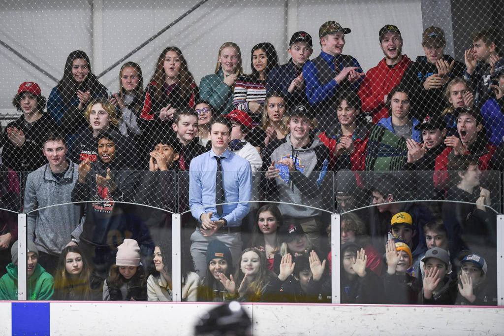 Juneau-Douglas students cheer on their classmates against Monroe Catholic at the Treadwell Arena on Friday, Nov. 15, 2019. JDHS won 13-0. (Michael Penn | Juneau Empire)