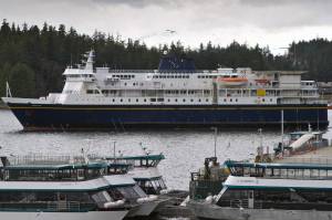 The Alaska Marine Highway Systems M/V Kennicott pulls away from the Auke Bay Ferry Terminal in this August 2014 photo. (Michael Penn | Juneau Empire File)