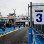 Walk-on passengers and vehicles load onto the LeConte ferry for a trip to Hoonah and Gustavus at the Alaska Marine Highway Systems Auke Bay Terminal in July 2019. (Michael Penn | Juneau Empire File)