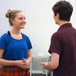 Abigail Zahasky reacts to Dakota Morgan during rehearsals for Newsies, Friday, Nov. 15. Theatre at Latitude 58s latest production runs this weekend. (Ben Hohenstatt | Capital City Weekly)