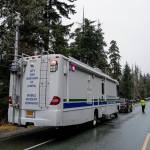 Juneau Police Department officers document a single-vehicle wreck near Mile 20 Glacier Highway that left 2 dead and 2 in critical condition on Thursday, Nov. 21, 2019. (Michael Penn | Juneau Empire)
