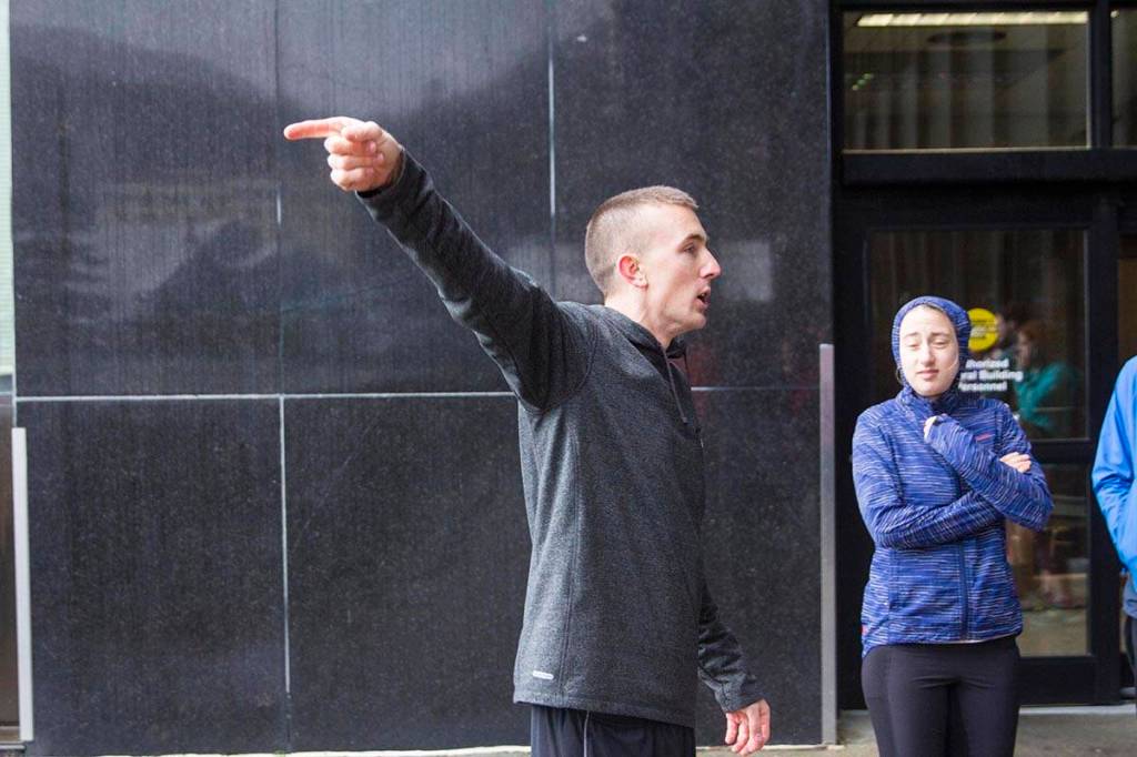 Lt. Drew Stafford explains the route before a Coast Guard 5K Turkey Trot through Juneaus harborfront on Nov. 22, 2019. (Michael S. Lockett | Juneau Empire)