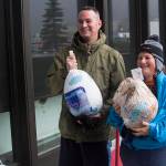 Chief Petty Officer Matthew Schofield and Jenny Smith, a civilian engineer with the Civil Engineering Unit, won turkeys in a raffle following the Coast Guards 5K Turkey Trot through Juneaus harborfront on Nov. 22, 2019. (Michael S. Lockett | Juneau Empire)