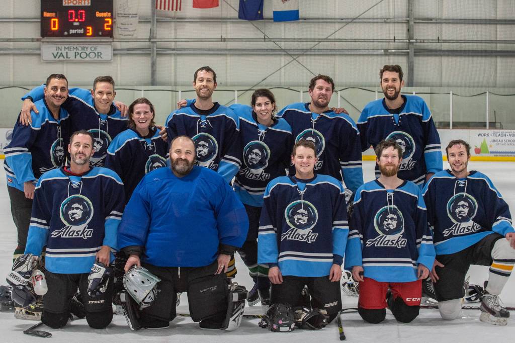 The JAHA C Tier fall champions Alaska Airlines pose for a photo after defeating Coeur Alaska 2-0 in the title game Sunday at Treadwell Arena. Alaska Airlines players (not in order pictured): Brady Wilson, Suzanne McGee, John Lamantia, Blake Rider, Barney Schneider, Ana Enge, Katherine Cornelius, Jeffrey Smith, Jason Tapley, Croix Fylpa, Justin Poff, Ken Arnold, Patrick Rodgers. (Courtesy Photo | Claire Baldwin)