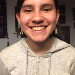 Rhiannon Wenzel models her sisters porcupine quill earrings in Wrangell. (Courtesy Photo | Maleah Wenzel)