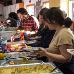 Volunteers came together to cook and serve a Thanksgiving meal for Yaakoosge Daakahidi High School students at the Zach Gordon Youth Center on Nov. 27, 2019 following a crash that killed two YDHS students last week. (Michael S. Lockett)