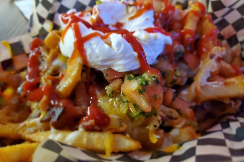 The loaded fries basket from Devils Hideaway at Squirez Bar in Auke Bay. (Ben Hohenstatt | Juneau Empire)