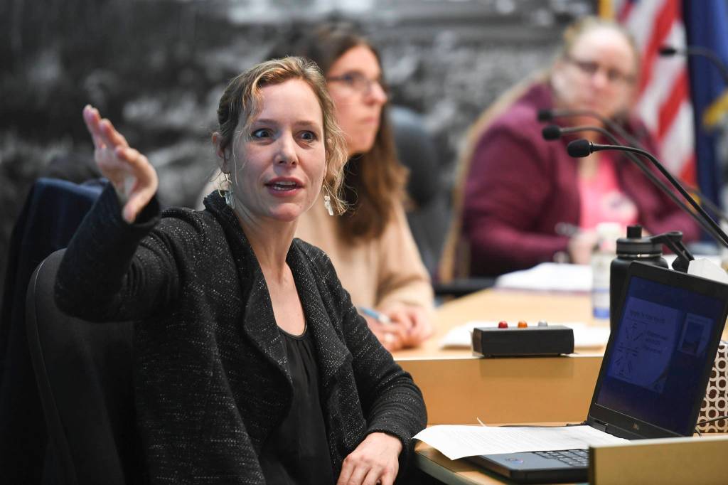 Alexandra Pierce, a planning manager at the City and Borough of Juneau, gives a presentation to the Tourism Industry Task Force in the Assembly chambers on Tuesday, Dec. 3, 2019. (Michael Penn | Juneau Empire)