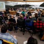 A full house watches the Tourism Industry Task Force in the Assembly chambers on Tuesday, Dec. 3, 2019. (Michael Penn | Juneau Empire)