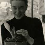 Dale DeArmond holds skunk cabbage in this photo by Bob DeArmond. (Courtesy Photo | The DeArmond Estates)