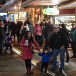 Residents walk Seward Street during Gallery Walk on Friday, Dec. 6, 2019. (Michael Penn | Juneau Empire)